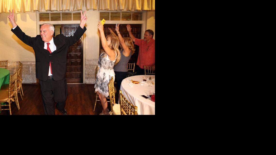 
Newly re-elected mayor of Coral Gables Jim Cason shares some moments with his followers at his campaign headquarters at the Woman's Club in Coral Gables on Tuesday, April 14, 2015.
