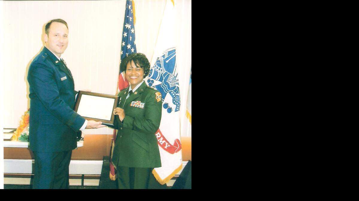 
Lt. Col. Valarie Austin with Maj. Gen. Noel T. (Tom) Jones at Austin’s 2008 retirement ceremony from the Army.
