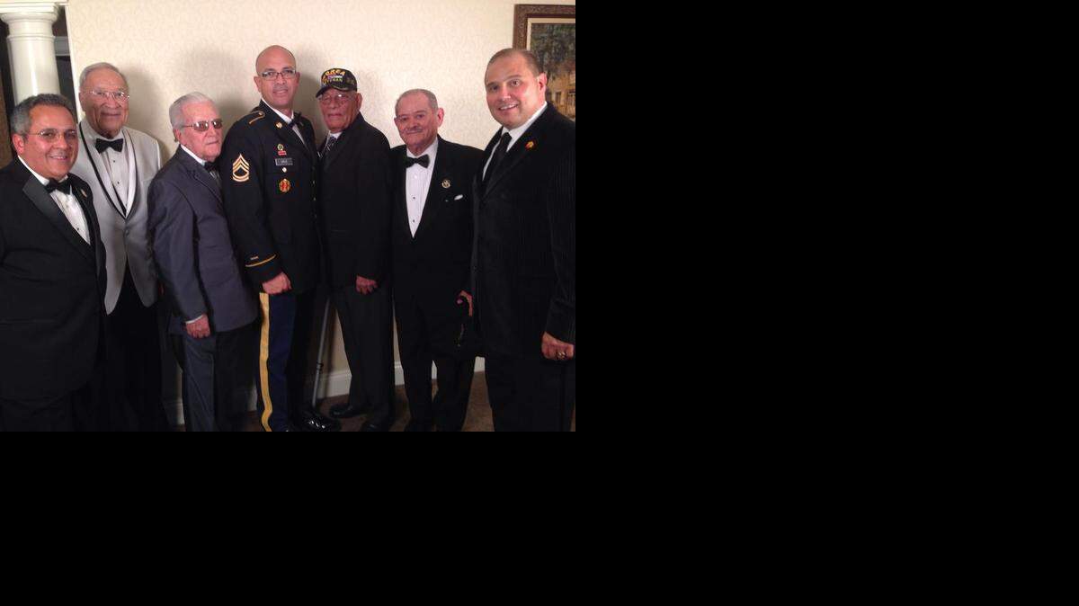 
Congressional Gold Medal Design Team Liaison Sam Rodriguez is joined by (L-R) Borinqueneers Joe Pickard and Anibal Albertorio; Military Escort SFC Juan Cruz; Borinquineers Enrique Vazquez Vega and Celestino Cordova; and Rafael Fantauzzi, president of the National Puerto Rican Coalition after the Hispanic Heritage Awards. The Borinqueneers were honored with the Congressional Gold Medal, the highest civil honor awared by Congress. 
