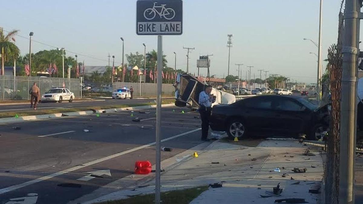 Four were hurt in a violent crash Tuesday morning at Northwest 27th Avenue at 88th Street.