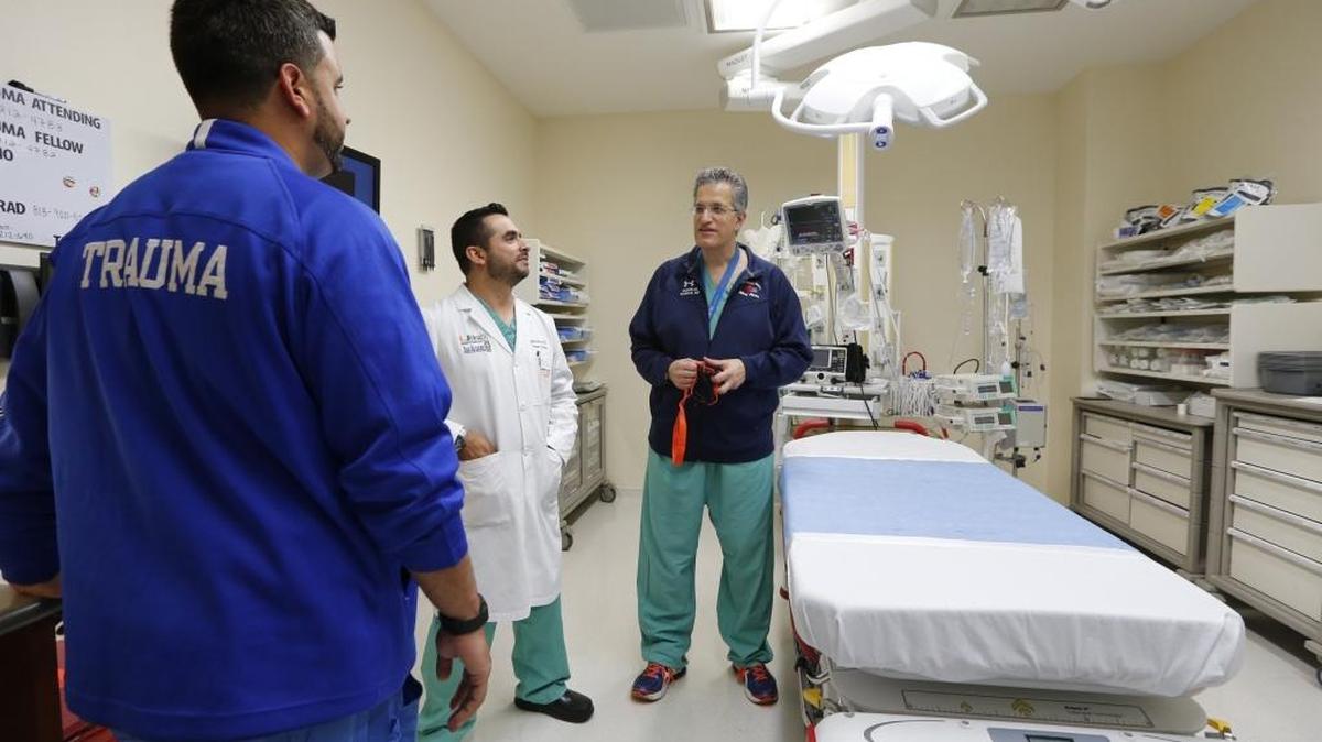 Trauma nurse, Luis DeRosa, left, with trauma surgeon Dr. Gabriel Ruiz and Dr. Nicholas Namias inside one of the new trauma units on Wednesday, May 4, 2016. The new trauma center at Jackson South Community Hospital is a Level II facility.