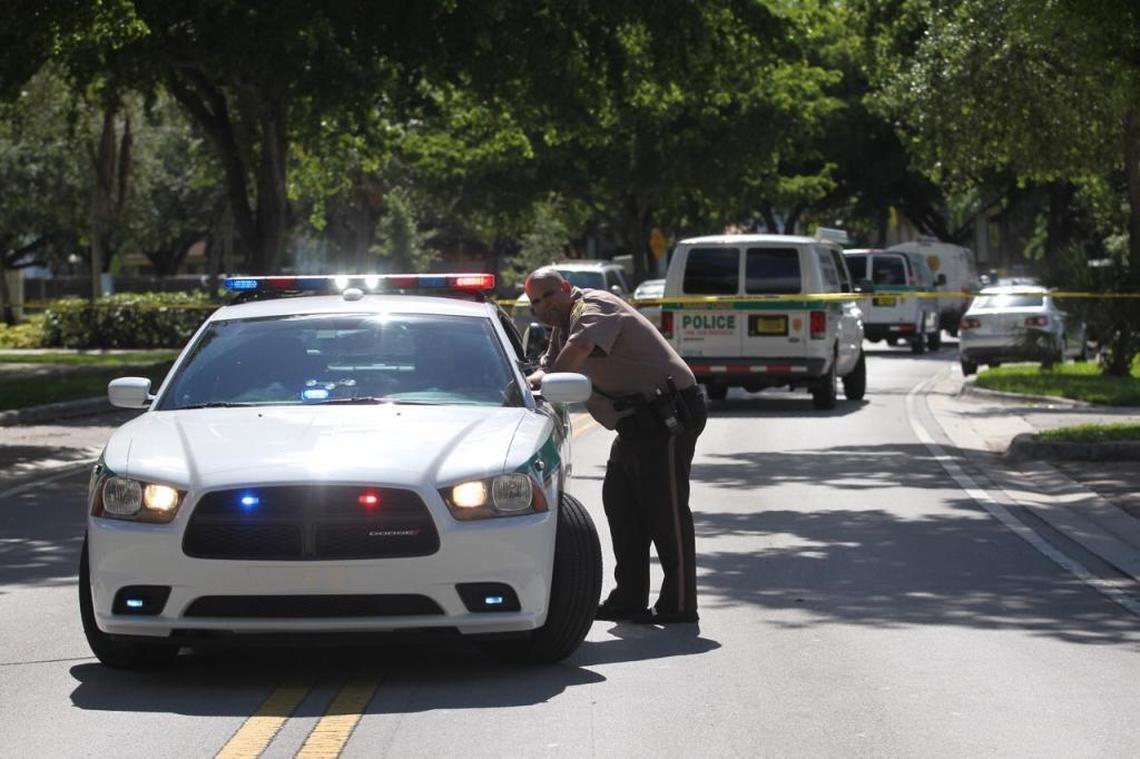 A rookie Miami police officer fatally shot a man stabbing a woman in Miami Lakes on Sunday morning, according to the head of the local police union.
