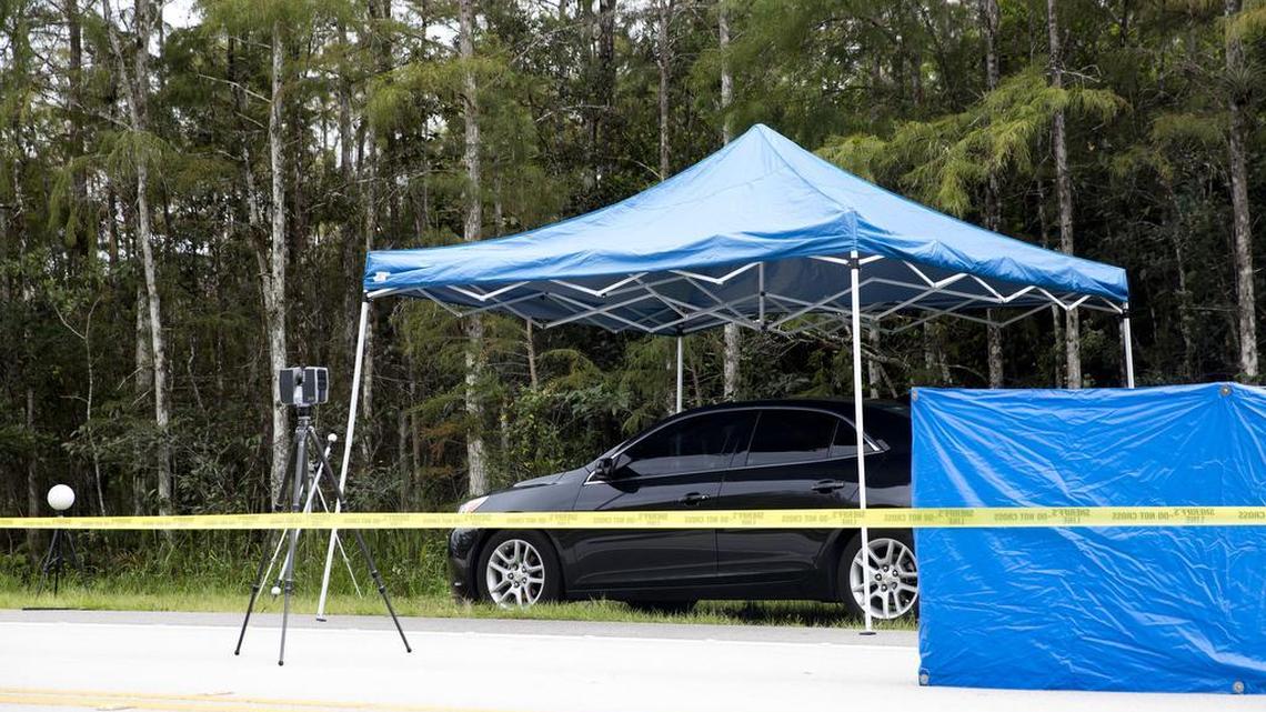 The Collier County Sheriff's Office and Miccosukee Police Department investigate a crime scene along East Tamiami Trail Thursday, October 20, 2016 in Ochopee, Fla.