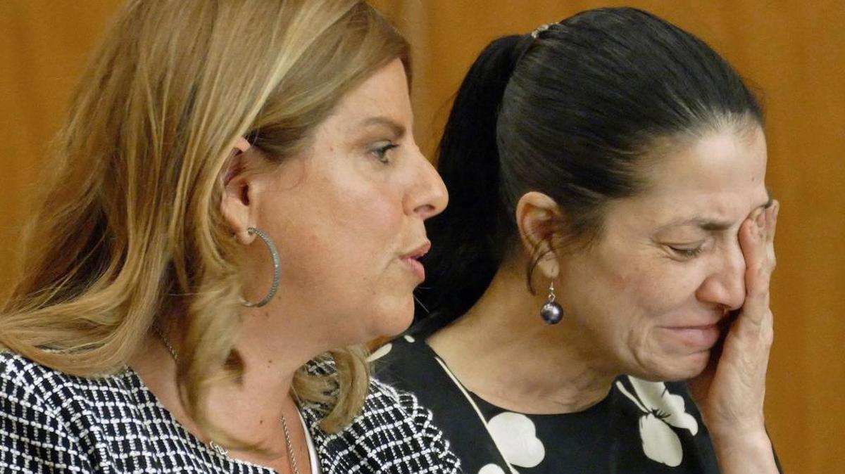 Marilyn Aguilera, accused of maiming a South Dade High principal in a DUI crash, was taken into custody Wednesday after she tested positive for marijuana. She is pictured here during a hearing in July, alongside attorney Ana Davide, left.