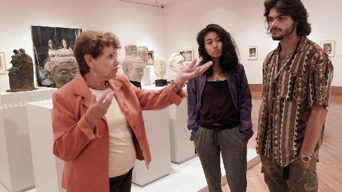FIU student Michael Zaldua was photographed by the Miami Herald in 2014 at the Frost Museum on campus. He’s on the right, listening to Carol Damian, who was then director of the Frost Art Museum-FIU.