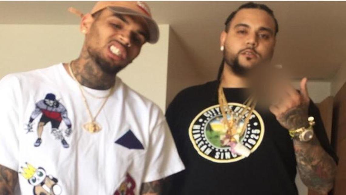 Harrison Garcia, who is on trial in Miami federal court for alleged drug dealing, pictured here with rapper Chris Brown. An agent revealed Thursday that Brown paid $15,000 to Garcia, allegedly for drugs.