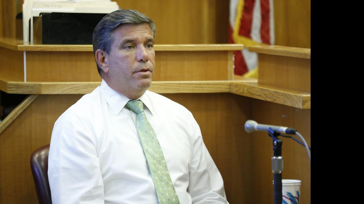 
Miami Homicide Detective Rolando Garcia testifies during a bail hearing for Marc Wabafiyebazu on Wednesday, May 27, 2015. 
