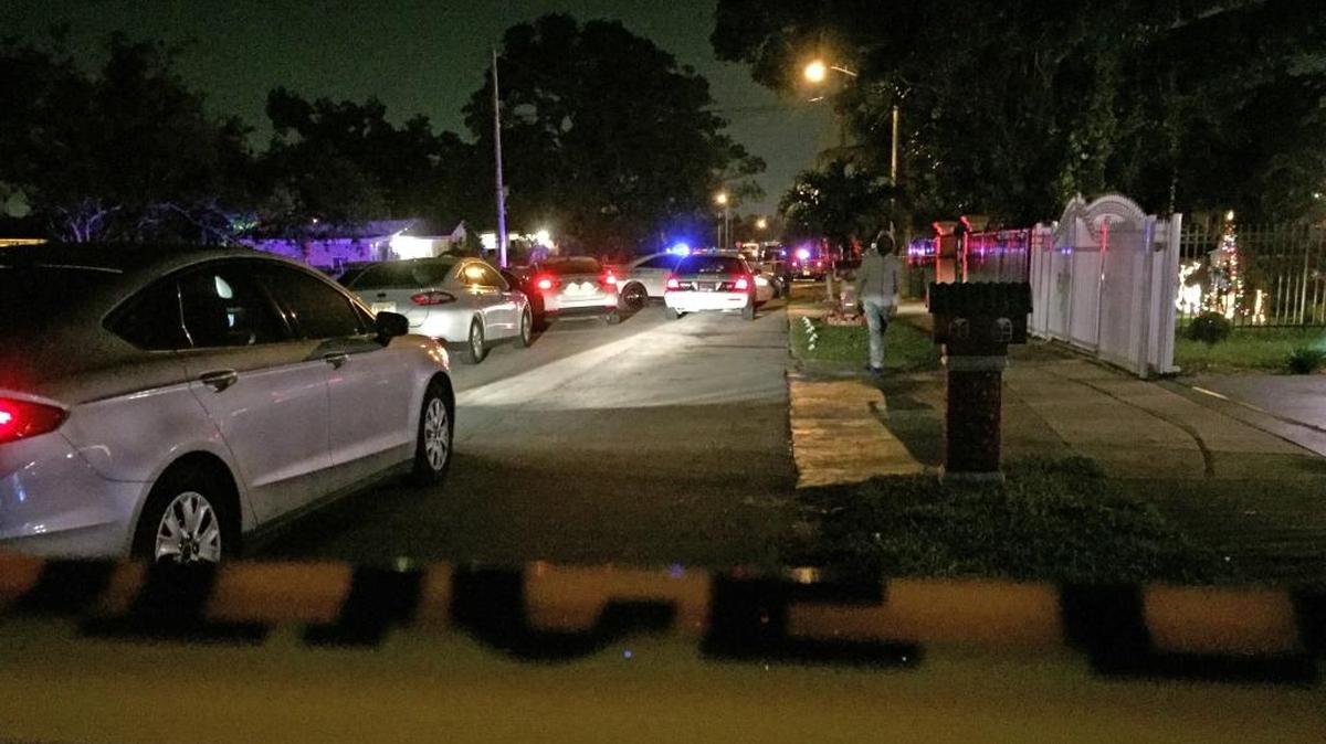 Yellow crime scene tape marks the site in Miami’s West Little River neighborhood where a 16-year-old boy was shot and killed Friday night.