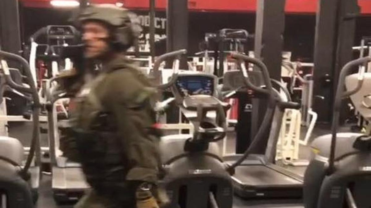 Geoffrey Clausen posted a screenshot of a picture of a federal agent inside his gym, iron Addicts Gym Wednesday morning.