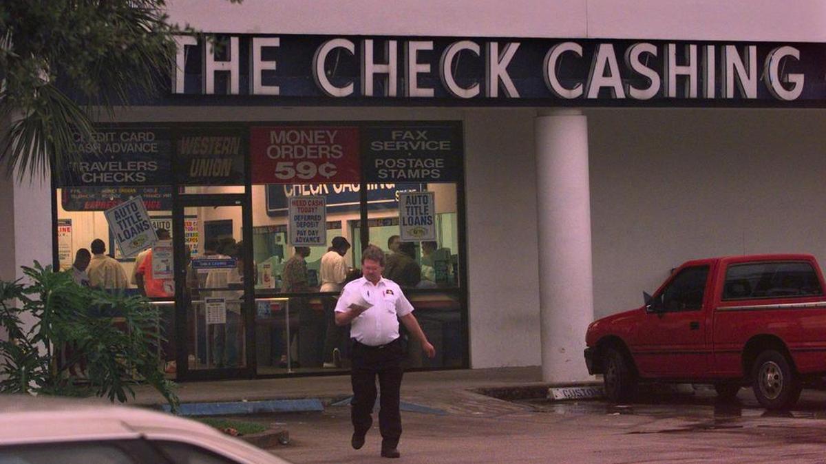 
South Florida check-cashing business are under new scrutiny from federal regulators because tax fraud scamsters have often used their services. 
