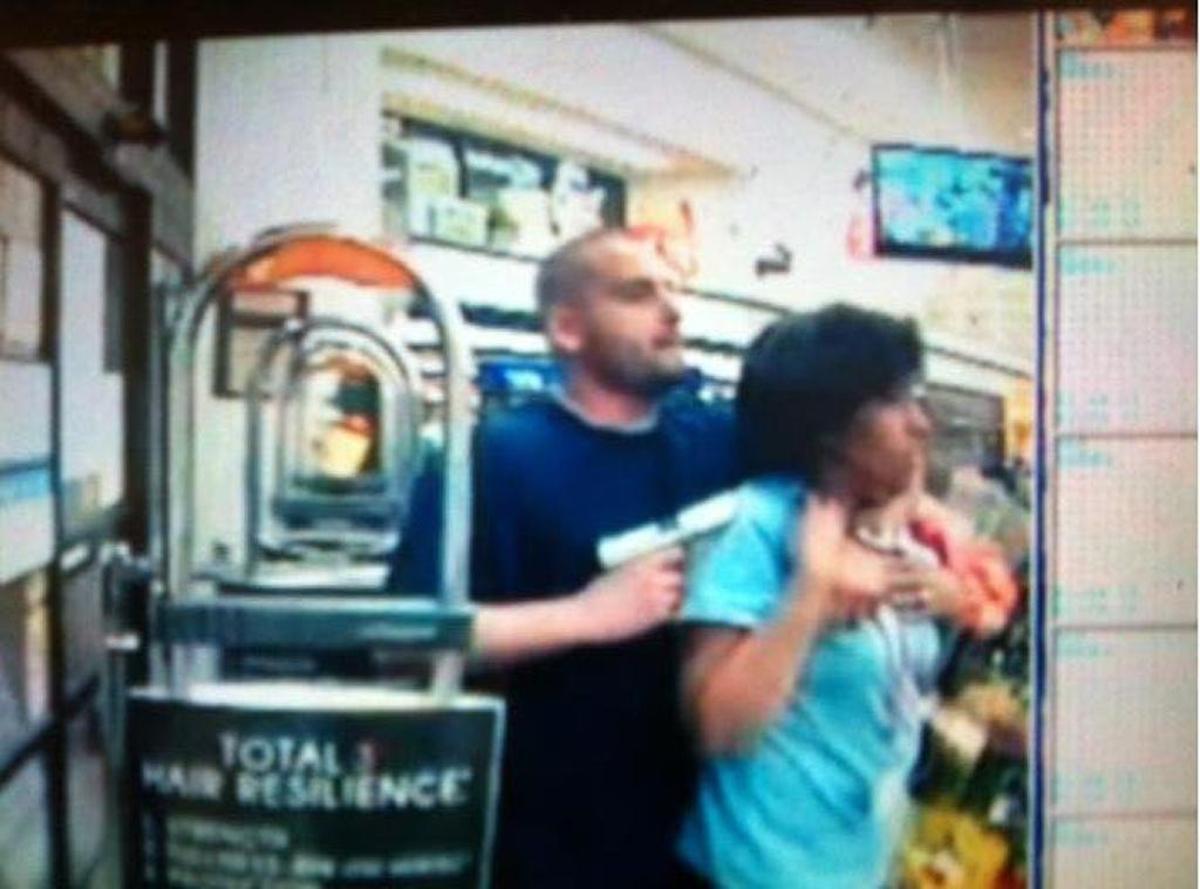 Photo captured on surveillance camera of suspected gunman Adrian Montesano, who was killed after an armed robbery, wild chase and shootout that left several cops wounded.