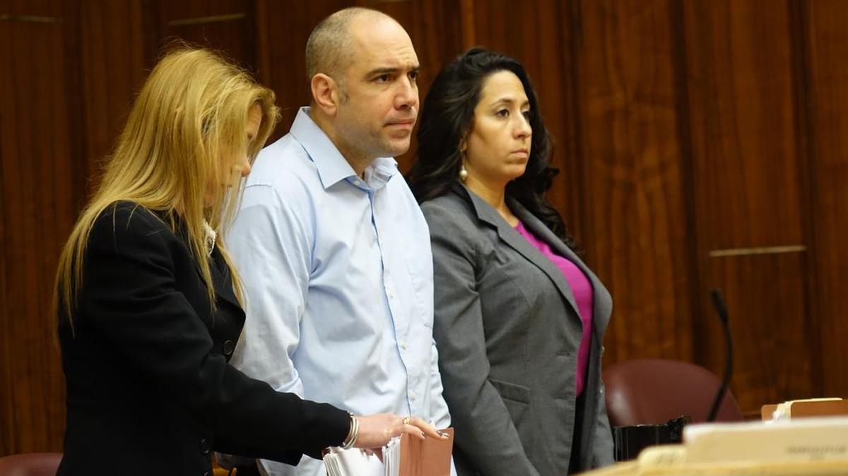 Defendant Ariel Castro in trial Monday for the killing of his mother, Maria Hernandez, in Hialeah in January 2011. He is pleading not guilty by reason of insanity. He is flanked by defense lawyers Erica Gerstin (left) and Damaris Del Valle, of the Public Defender’s Office.
