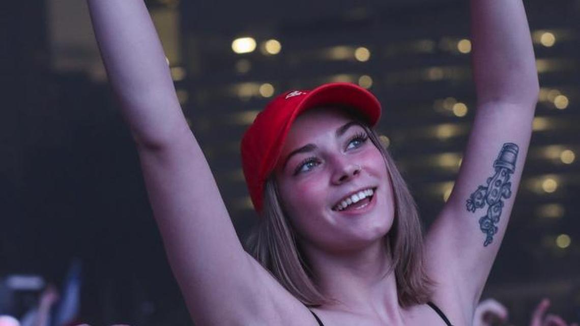 Guests dance at the Main Stage during the third day of Ultra Music Festival in downtown Miami on Sunday, March 26, 2017.