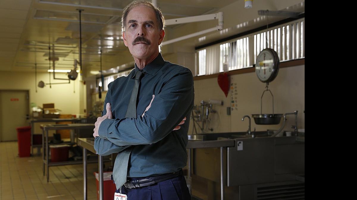 
NO VISITS: ‘If they pass out, they’re going to hit their head hard on the floor,’ says Larry J. Cameron, spokesman for the Miami-Dade Medical Examiner about relatives identifying the dead.
