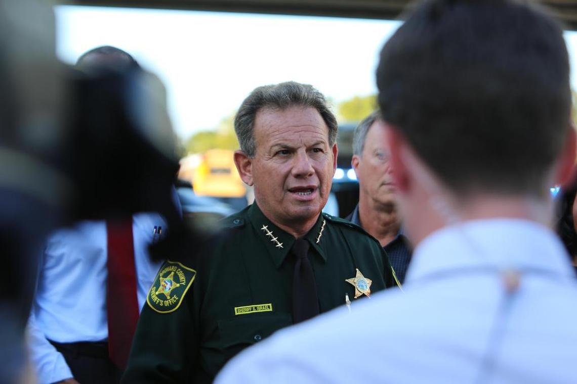 Broward County Sheriff Scott Israel addresses the media about the mass shooting at Marjory Stoneman Douglas High School in Parkland on Feb. 14, 2018. On Wednesday, a week after the shooting, Broward’s top cop said that deputies assigned to school campuses would now be allowed to carry rifles on school grounds.