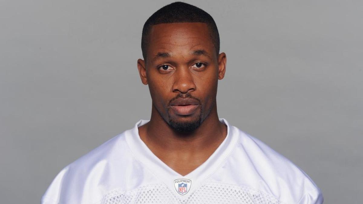 Former Miami Dolphin cornerback Dimitri Patterson was charged with battery on a law enforcement officer on Tuesday after trying to bolt from a Miami-Dade courtroom.
