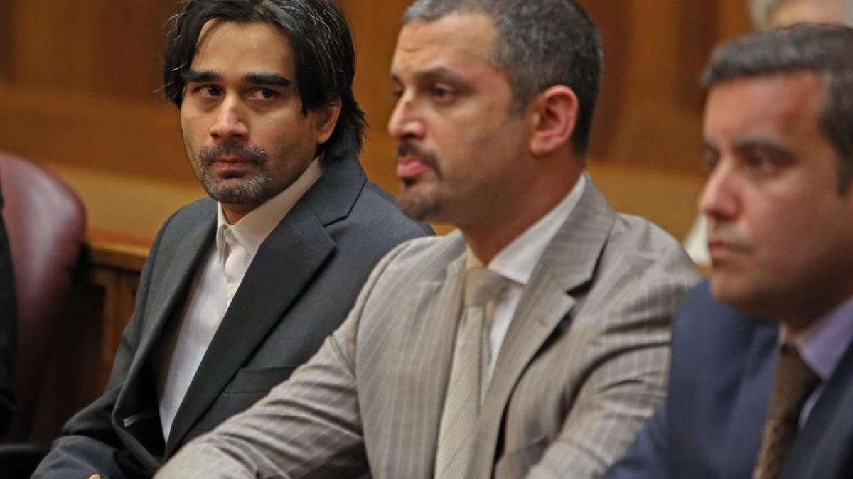Facebook killer Derek Medina is found guilty of second-degree murder in Miami on Wednesday, Nov. 25, 2015. Seated with Medina are attorneys Saam Zangeneh and Mauricio Padilla.