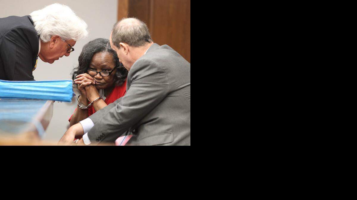 
Geralyn Graham, talks to her attorneys Michael Matters, left, and attorney Scott Sakin, right, before Miami-Dade Circuit Judge Marisa Tinkler Mendez. This was prior was to the reading of Graham's sentencing; she was convicted in the abuse and kidnapping of foster child Rilya Wilson, Tuesday, February 12, 2013.

