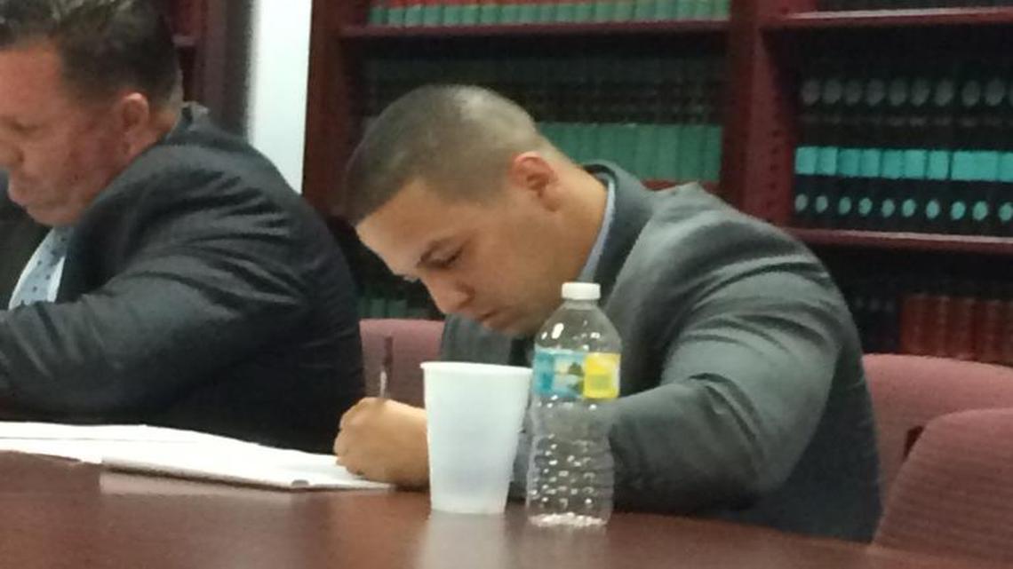 Adrian Rodriguez, fired from the Miami Police Department last summer over administrative issues and a suspect in a decade-old unsolved murder, during an arbitration hearing last week to get his job back.