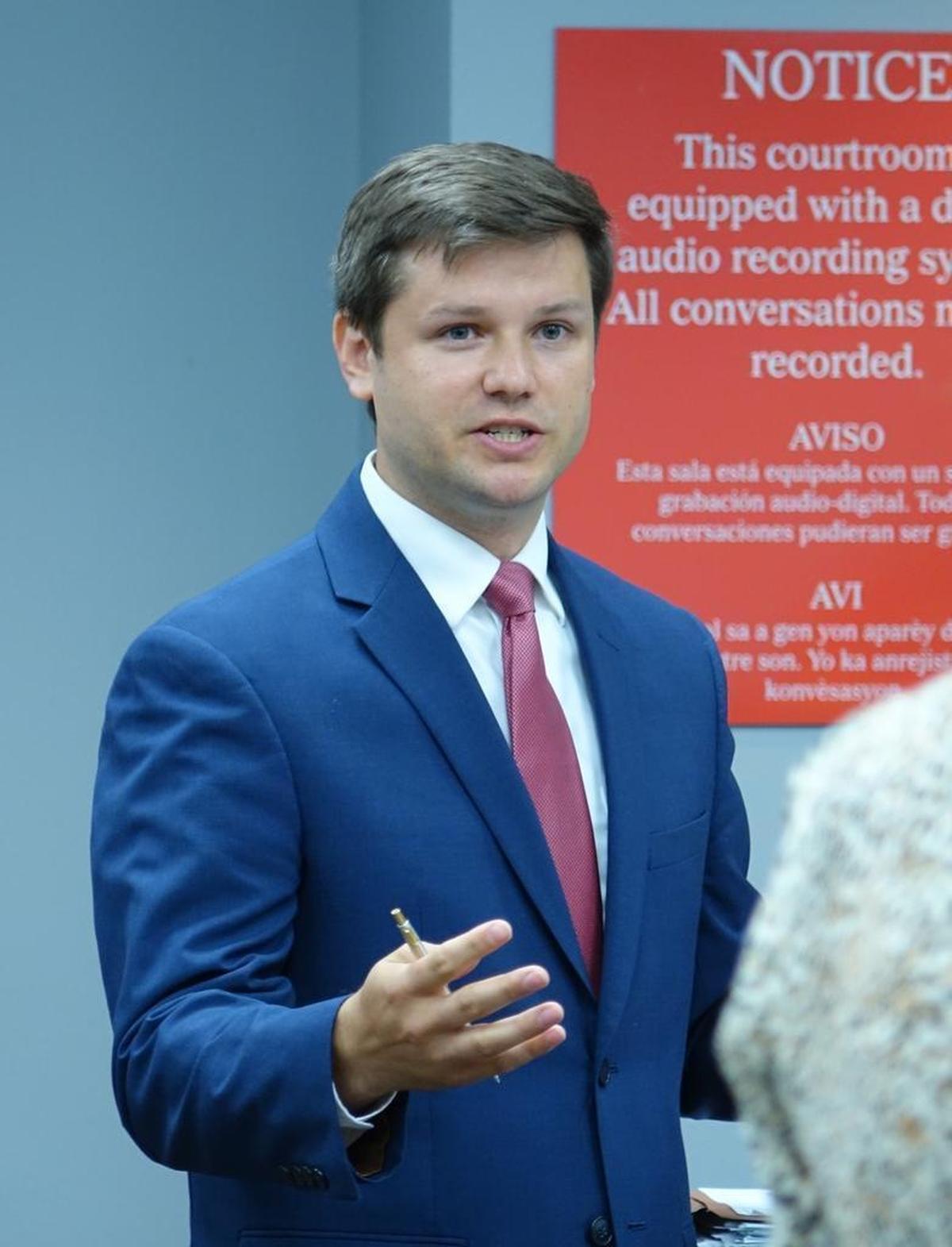Miami-Dade prosecutor Devon Helfmeyer speaks in court Wednesday in asking for for jail time for Gladys Coego, who admitted to voter fraud. A judge sentenced her to two years of house arrest.