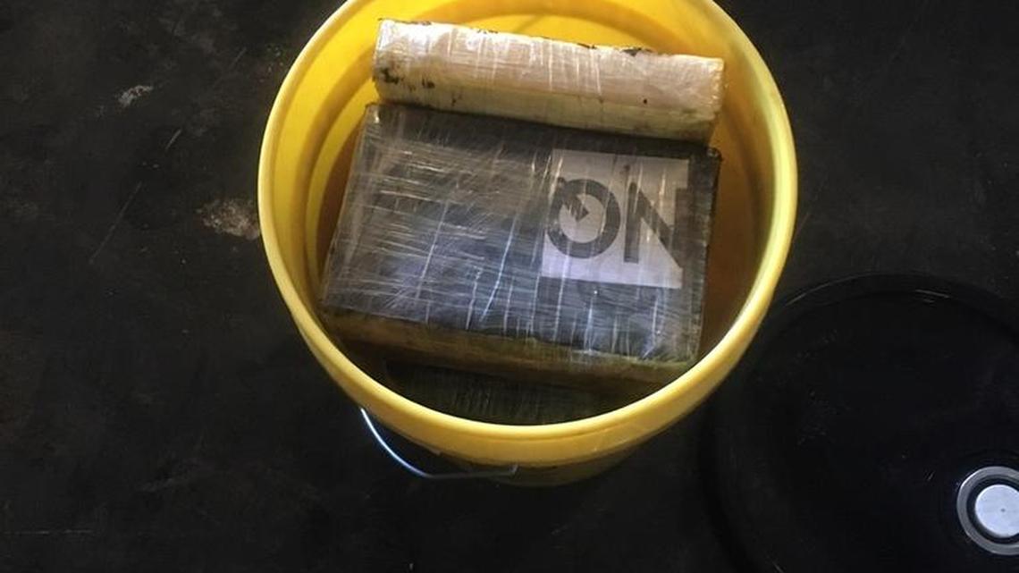 A photo of suspected cocaine found in a warehouse believed ot have been offloaded from a freighter on the Miami River.