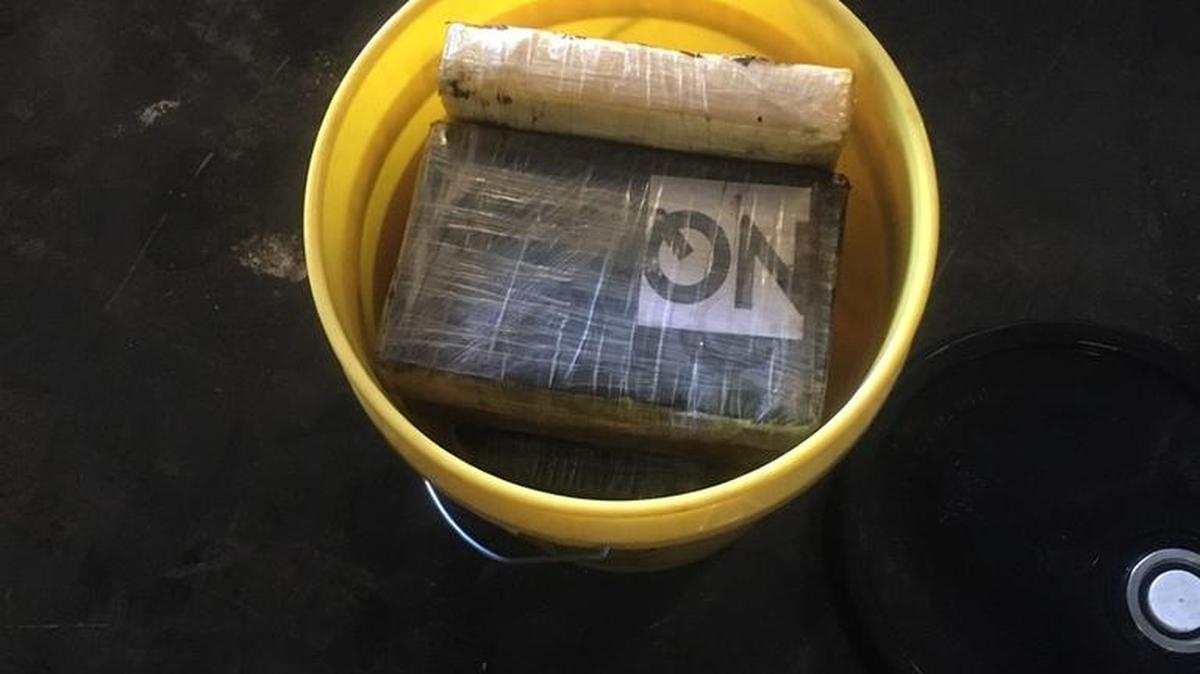 A photo of suspected cocaine found in a warehouse believed ot have been offloaded from a freighter on the Miami River.