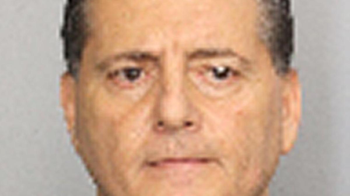 Jorge Farah, 56, behind bars in the Broward County jail, is suspected of robbing Marquis Bank in Coral Gables on Friday.