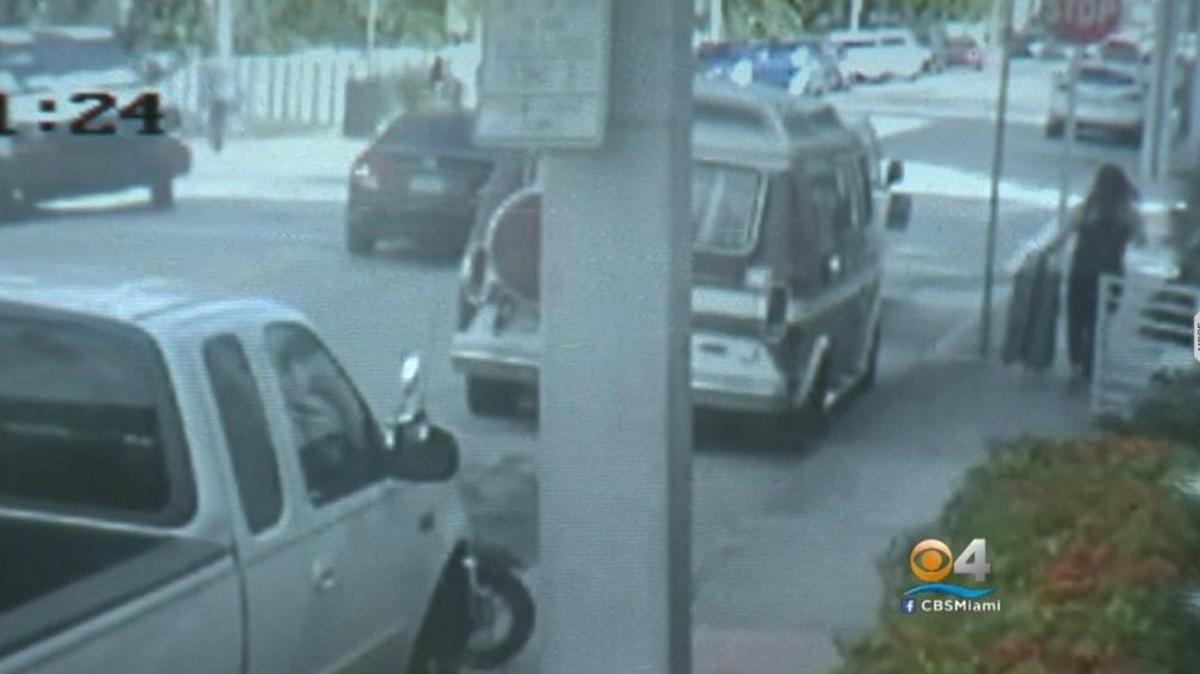 Surveillance video taken from Miami Massage Therapy cameras show a woman, identified by police as Valentina Zaeta, removing items from an apartment.