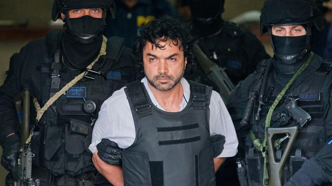 Argentine police walk with alleged Colombian drug kingpin Henry de Jesús López Londoño, also known as ‘Mi Sangre.’