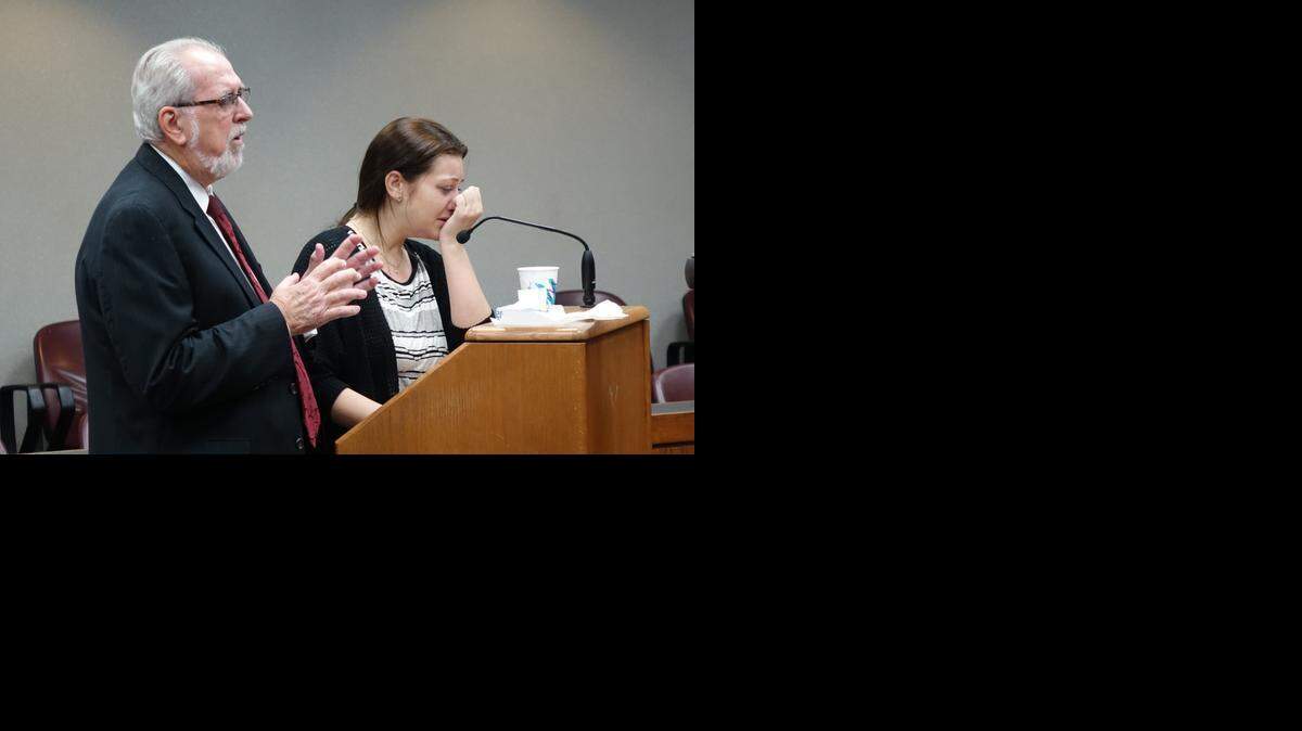
Lindsay Armada, about to surrender for prison Tuesday, is flanked by her lawyer, Edward O’Donnell. She killed two friends and injured a third in an August 2010 car crash in North Miami-Dade.
