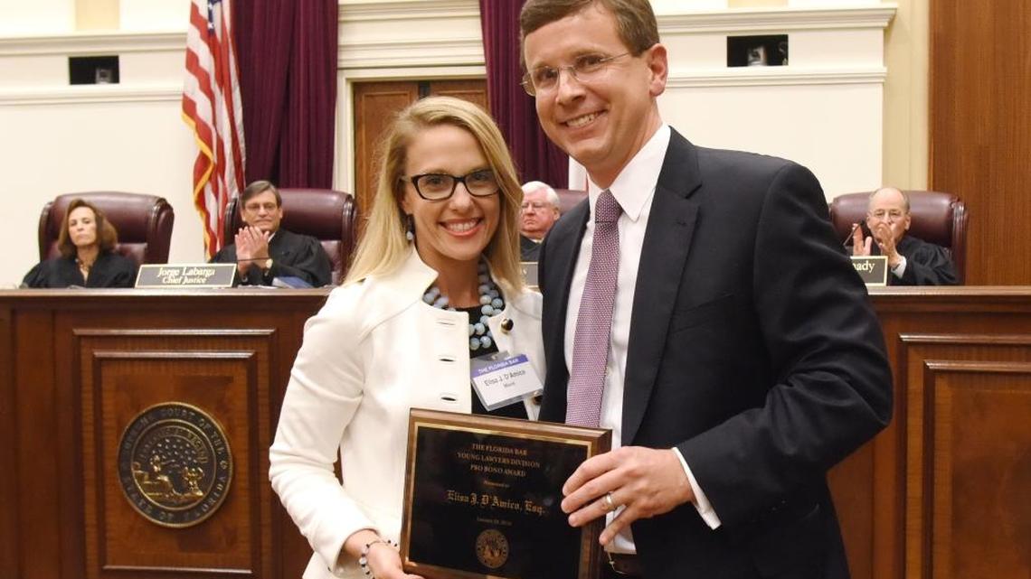 Elisa D’Amico and Gordon Glover, immediate past president of The Florida Bar’s Young Lawyers Division.