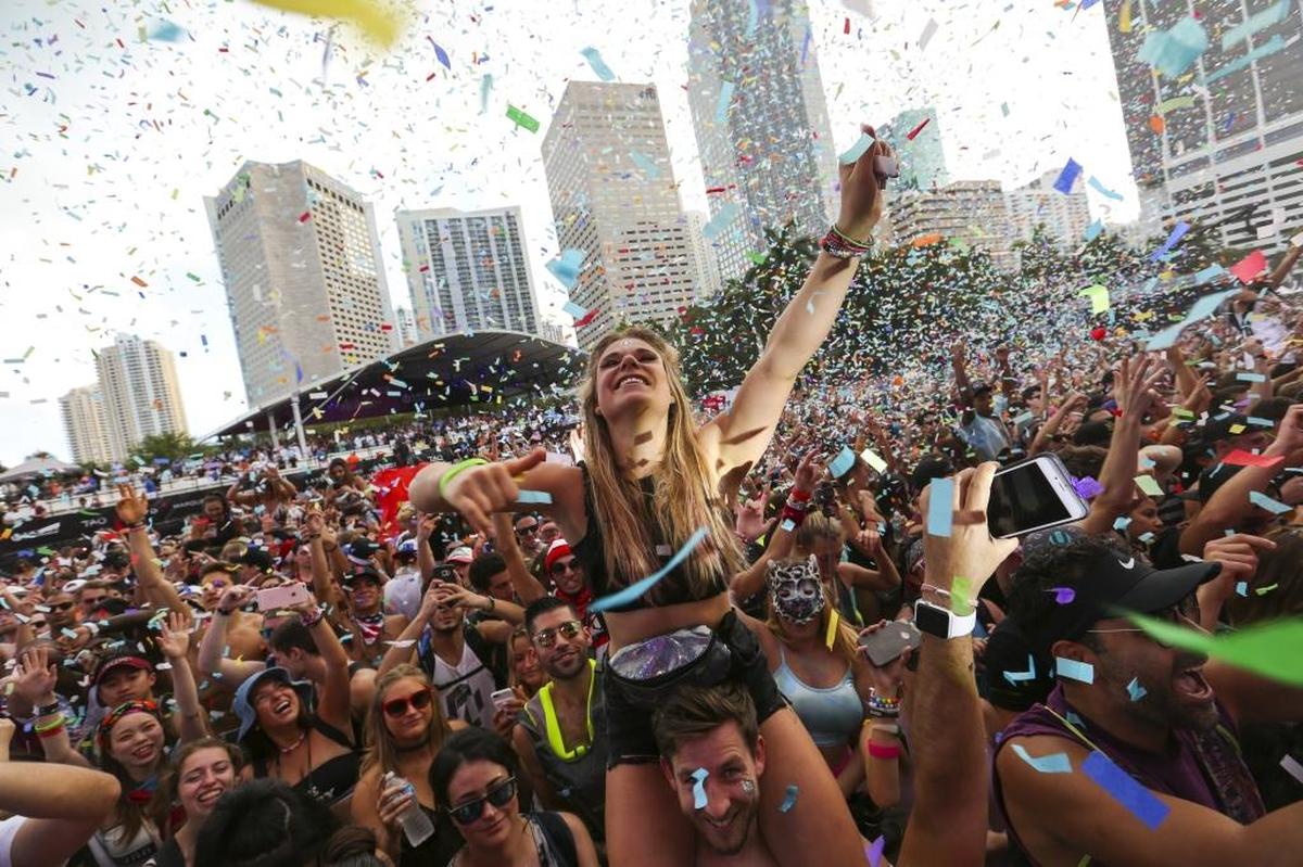 The condominiums that line Biscayne Boulevard offer a clear view into Bayfront Park, where more than 100,000 people are expected to attend the Ultra Music Festival at the end of March.