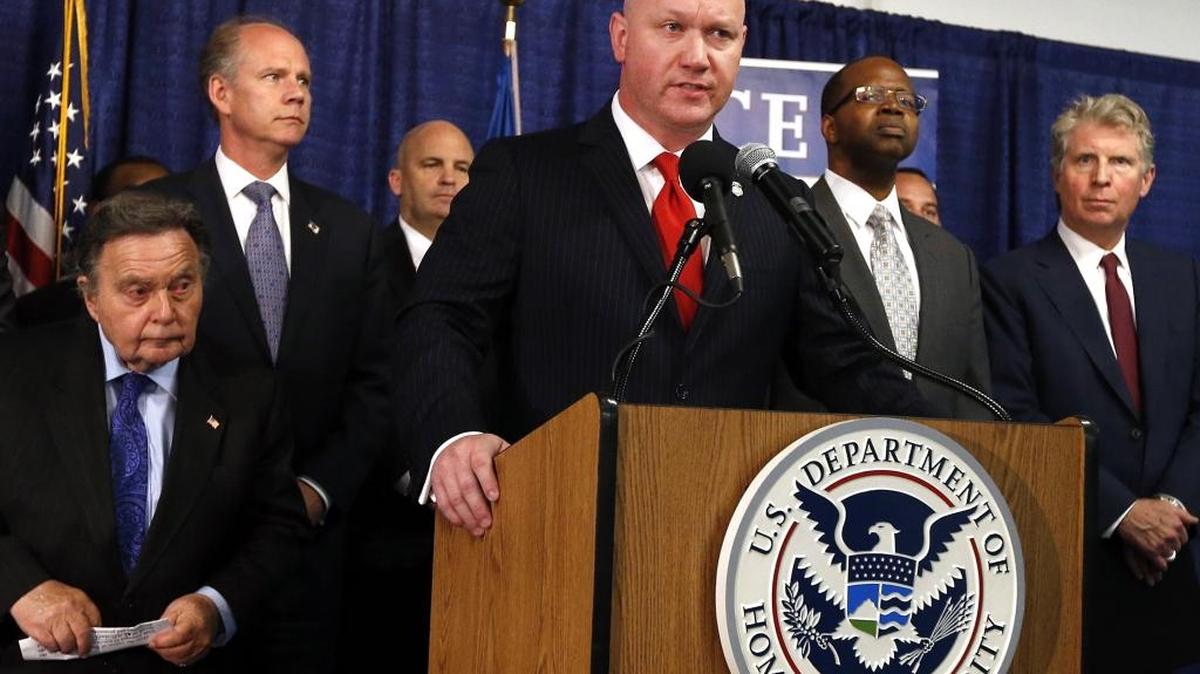 Homeland Security Investigations Special Agent James Haynes, center, announces the arrest of 71 individuals as part of Operation Caireen, a sweeping investigation into the anonymous trading of child porn over the Internet, during a news conference, Wednesday, May 21, 2014, in New York. Haynes is joined by Queens District Attorney Richard Brown, far left, Staten Island District Attorney Daniel Donovan, second left, Brooklyn District Attorney Kenneth Thompson, second right, and Manhattan District Attorney Cyrus Vance, far right.