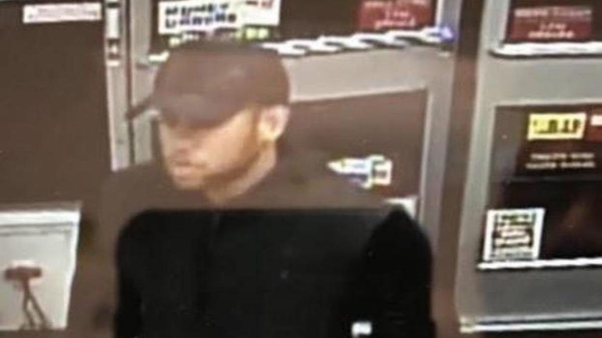 Miami police are looking for a man who robbed a convenience store at gunpoint on Wednesday.