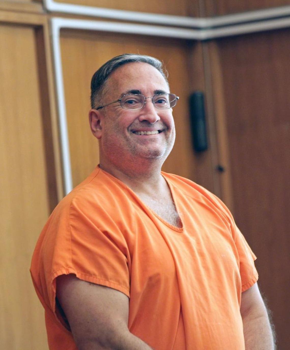 Gus Lopez, a former Miami Beach official who was convicted of corruption, was killed in 2017 in a car crash in Miami. He is pictured in 2015 as he pleaded guilty to corruption-related charges.