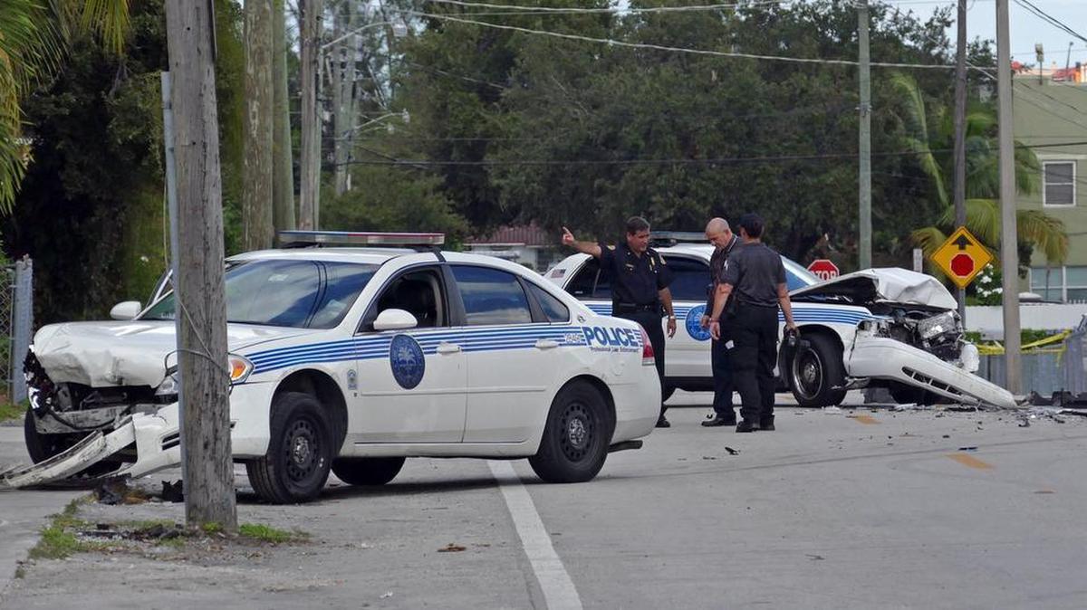 City of Miami police respond to a call in the 600 block of NW 28th Avenue and a woman steals a police cruiser and winds up going head on with a police officer responding to the call Friday, Oct. 30, 2015.