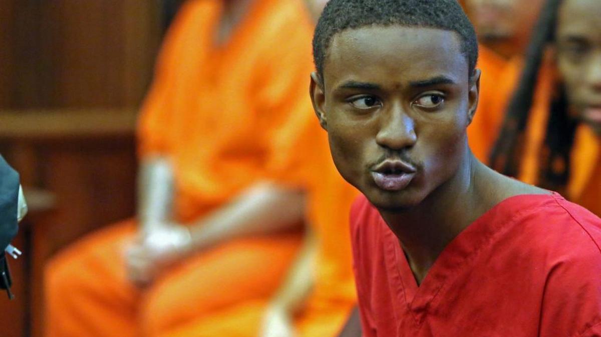 Deandre Charles, 15, says “I love you” to someone attending his arraignment hearing before Judge Jason Bloch in the 2014 murder of Rabbi Joseph Raksin on Monday, Dec. 14, 2015.