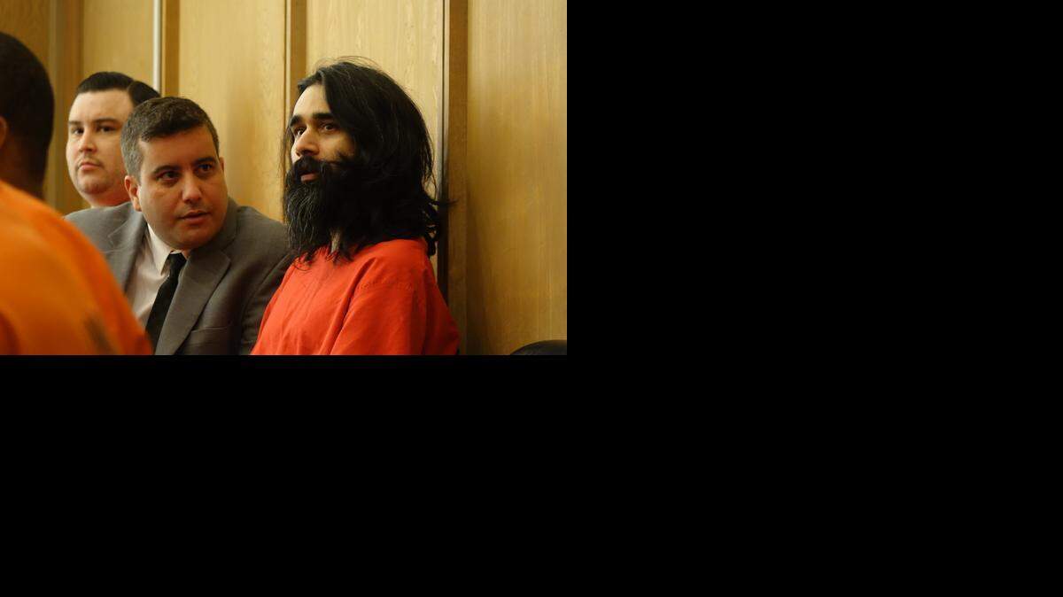 
Accused Facebook killer Derek Medina in court Thursday. His lawyer, Mauricio Padillo, is to the left.

