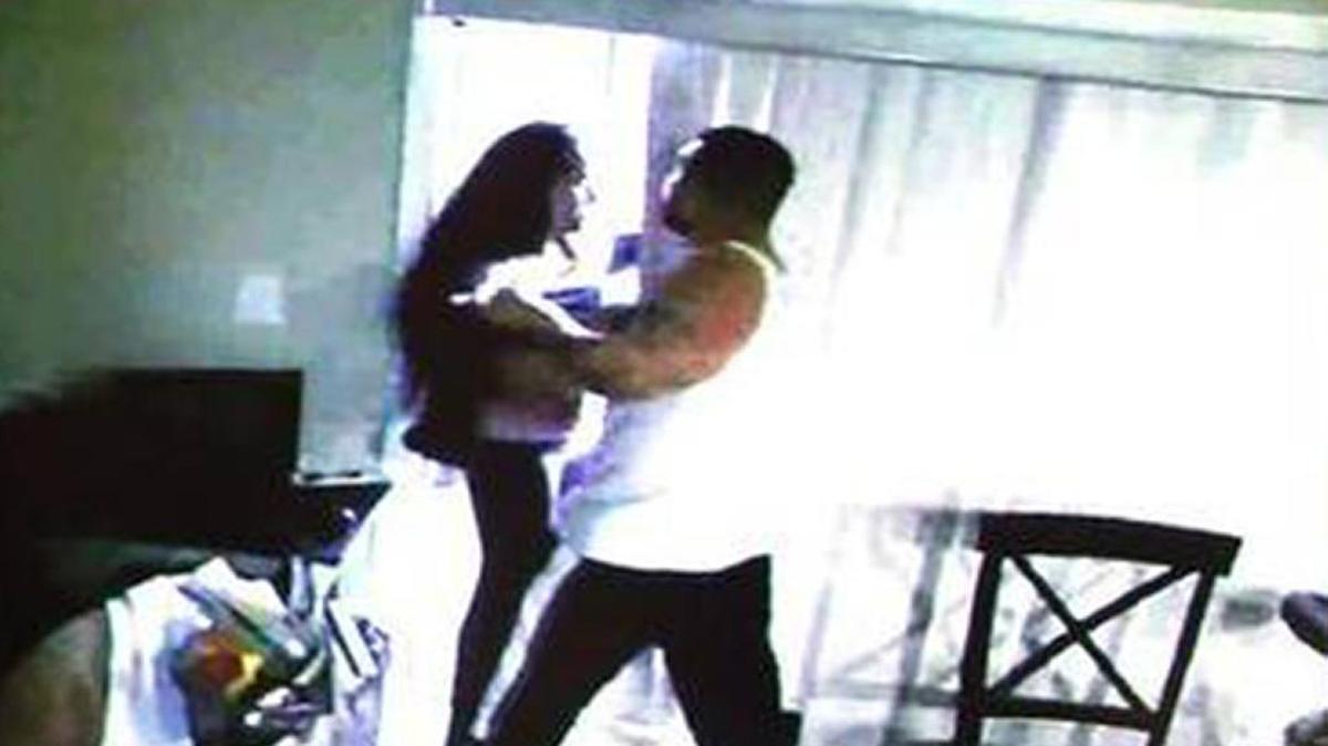 Framegrab from a 2012 or earlier video of the murder victim Jennifer Alfonso and defendant Derek Medina making contact in a home surveillance video that was shown during day five of Medina’s murder trial on Tuesday, Nov. 17, 2015. Medina killed his wife and then posted a photo of her body to Facebook. He claims self defense.