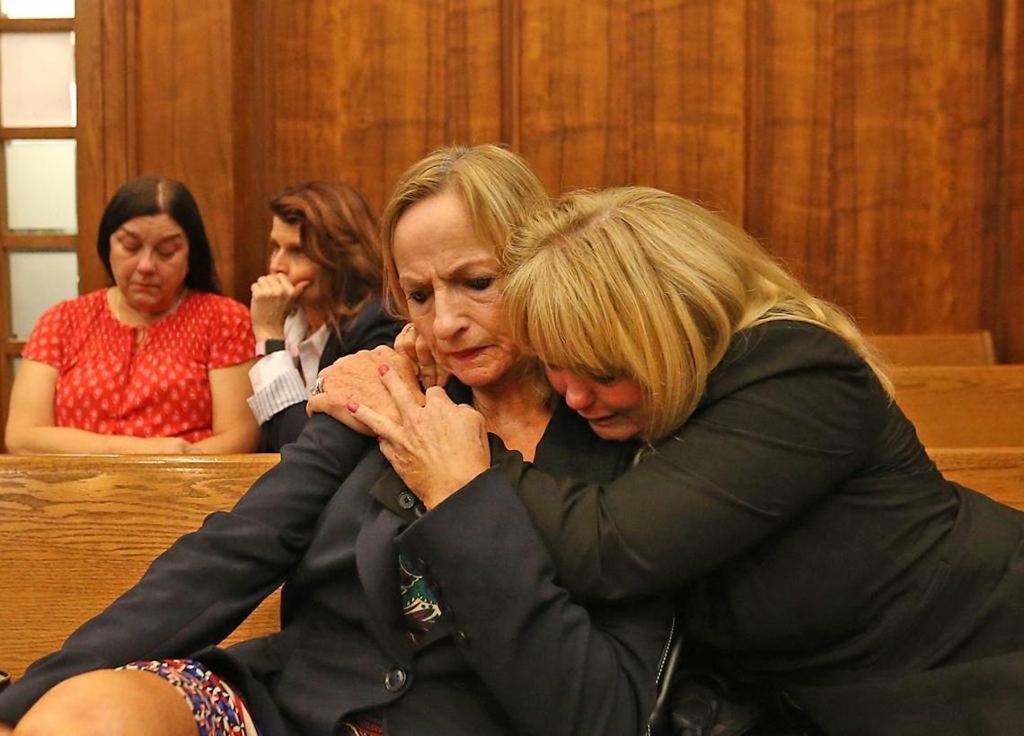 Two of Paul Sarnecki’s sisters, Mary Rollins, left, and Leslie Feliciano console each other during a resentencing hearing in August for Nakia Huggins. Huggins, as a teen-ager, murdered their brother Paul Sarnecki in 1991 as he sat in his car with his two young children. Huggins is asking for his life term to be reduced in a re-sentencing hearing in Judge Victoria Pino's Miami-Dade courtroom.
