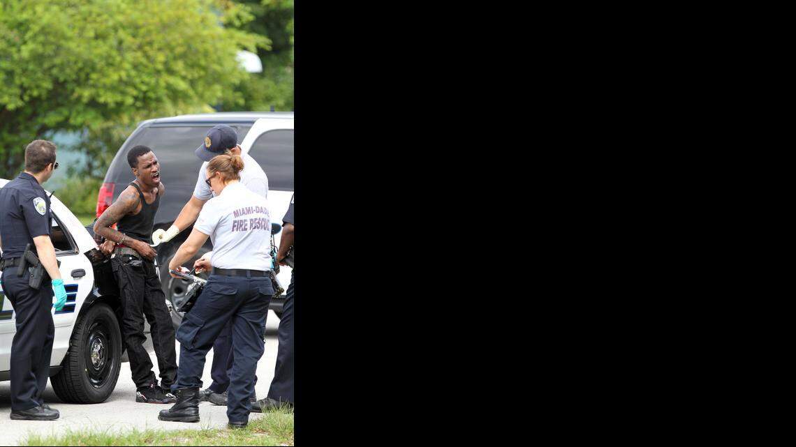 
Police work the scene of a shooting on Monday in the area of of Northeast 159th Street and 12th Avenue.


