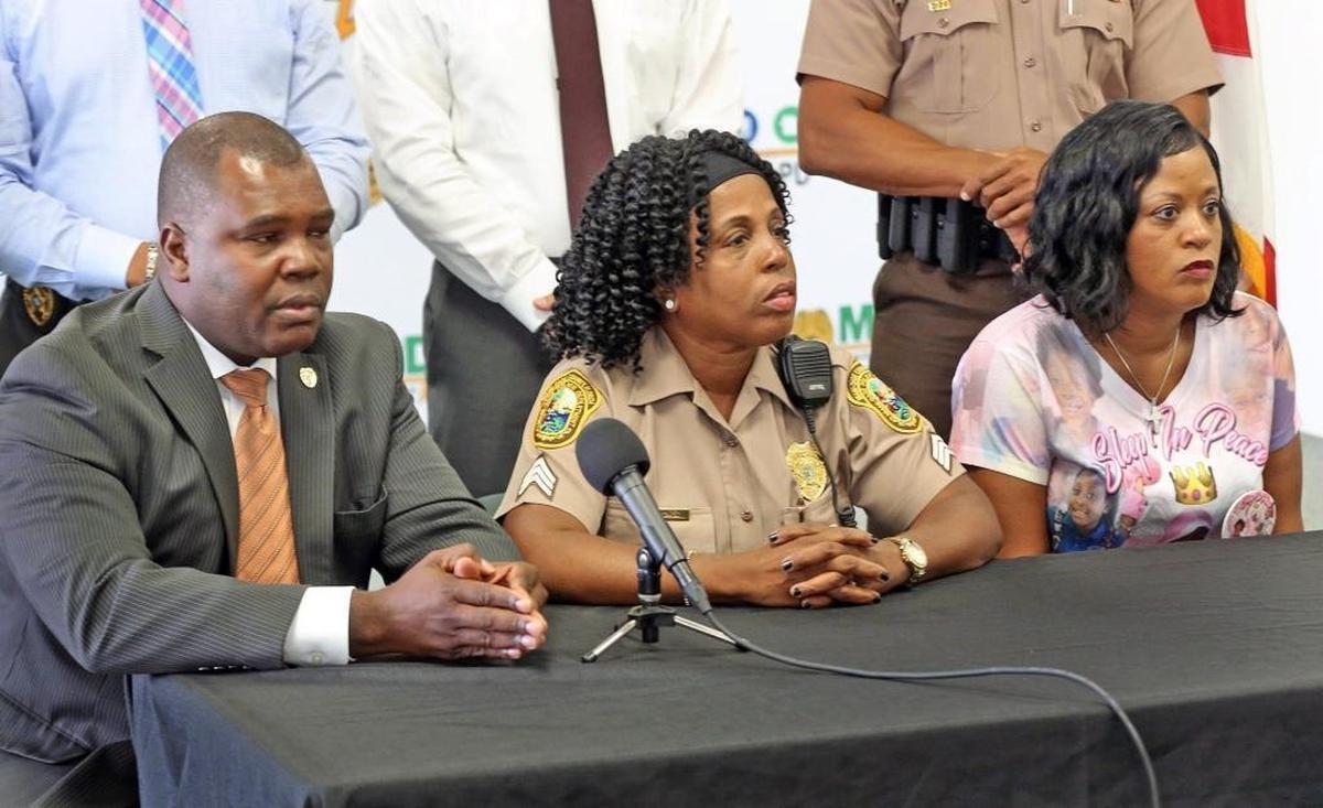 Miami-Dade Homicide Detective Rich Raphael, Miami-Dade police officer Brendolyn Spence and Lisa Brown, grandmother of Jada Page, are asking the public for help in identifying the person responsible for the murder of the 8-year-old girl, Monday, Aug. 28, 2017.