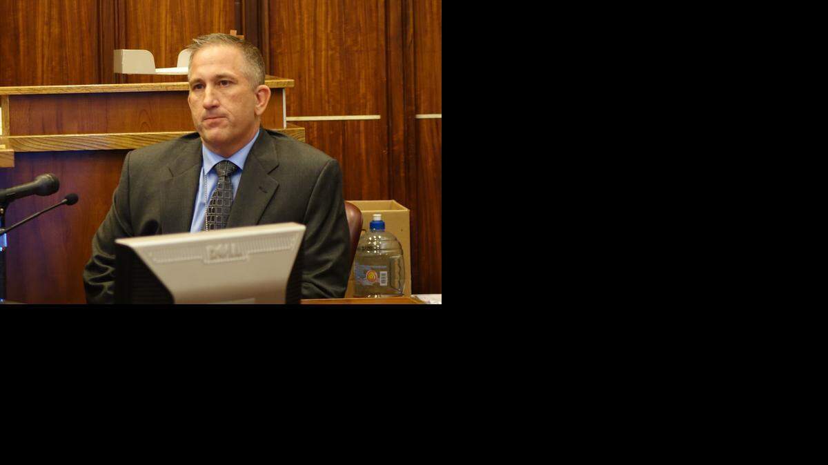
North Miami Beach Detective Craig Catlin testifies Monday about the police raid that ended with an officer shot in the arm and leg.
