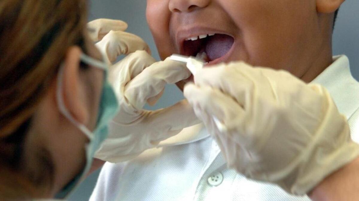 A Miami boy got his felony adjudication thrown out because the victim’s tooth, knocked out in a school bus fight, would have fallen out anyway.
