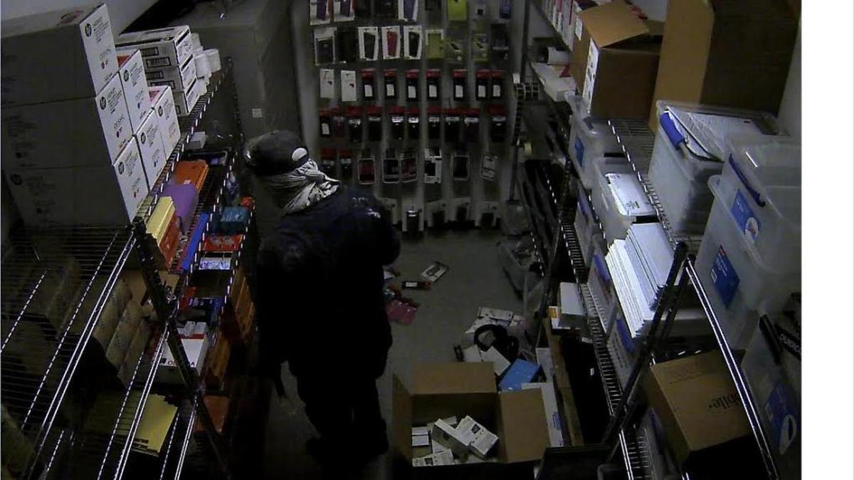 
A photo from surveillance video shows a burglary suspect at a Pinecrest T-Mobile store. Police say it’s Raiko Guerra Ramos, who was later found hiding in the ceiling.
