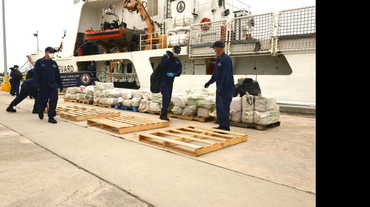 
Coast Guard personnel offload intercepted cocaine at the Miami Beach base earlier this month.
