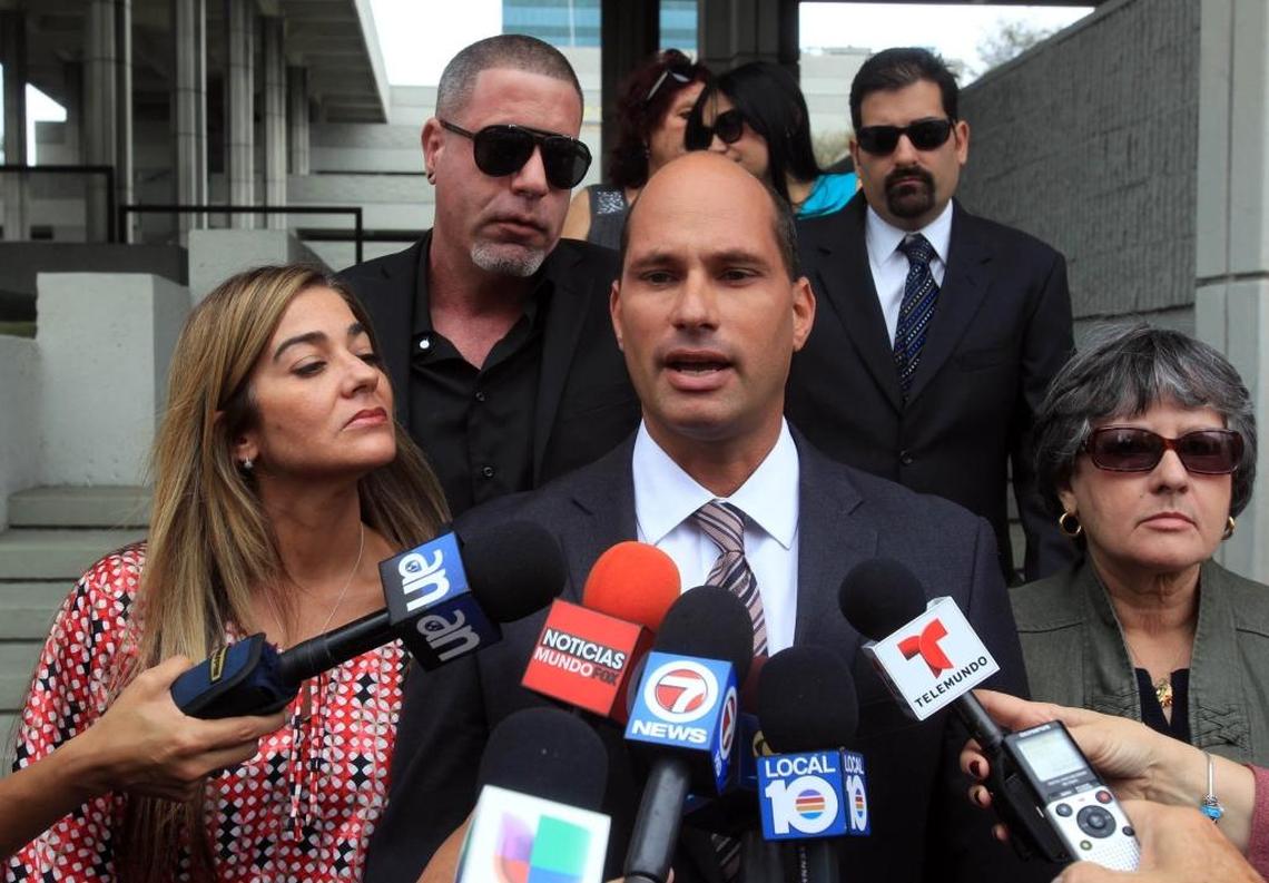 Former Sweetwater Mayor Manuel Maroño, pictured outside a Fort Lauderdale federal courthouse after his corruption arrest in 2013. To his right is his mother, Isolina Maroño, who was charged Thursday with a misdemeanor count of possessing too many absentee ballots.