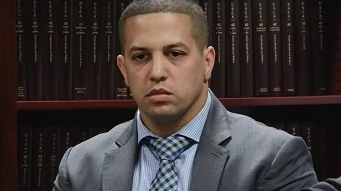 Miami police officer Adrian Rodriguez, seen here at an arbitration hearing in February, got his job back even though he is a suspect in a 2007 homicide. An arbiter ruled on Tuesday, May 30, 2017, that his firing was improper.