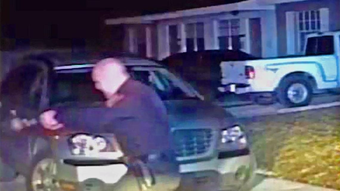 A framegrab from a slow-motion version of the encounter between Miami Gardens police officer Eddo Trimino and Lavall Hall shows the cop firing the fifth of five shots.