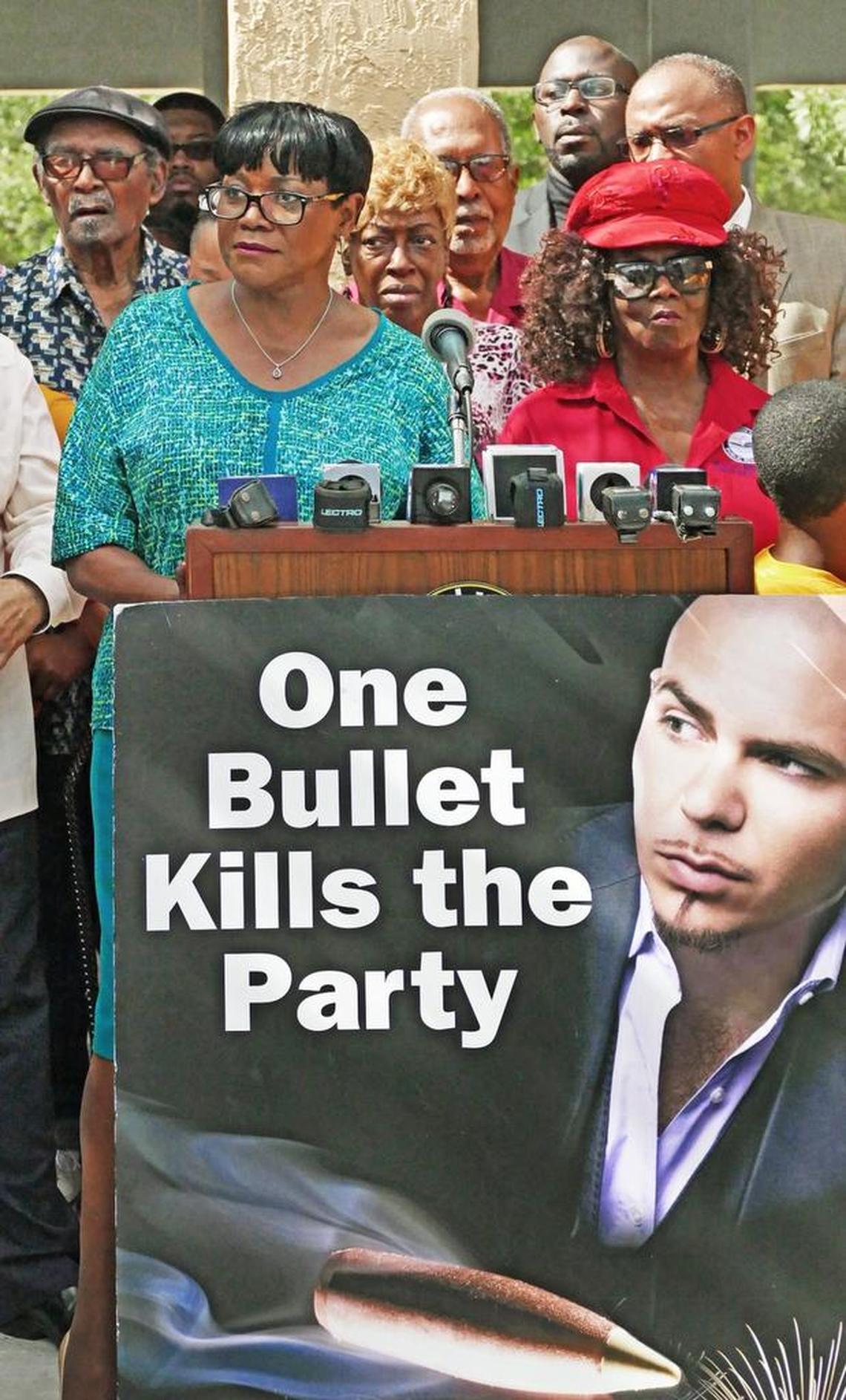 Miami-Dade Commission Vice Chairwoman Audrey Edmonson, left, holds her annual "One Bullet Kills the Party" press conference at Jefferson Reeves Sr. Park in Miami to urge the public from celebratory gun usage and to refrain from gun violence on the Fourth of July.